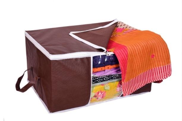 Set of three brown fabric storage bags with zippers and clear windows showing folded colorful clothes inside