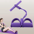 Purple resistance pedal exerciser with foam handles for home fitness and leg workouts, shown with woman exercising